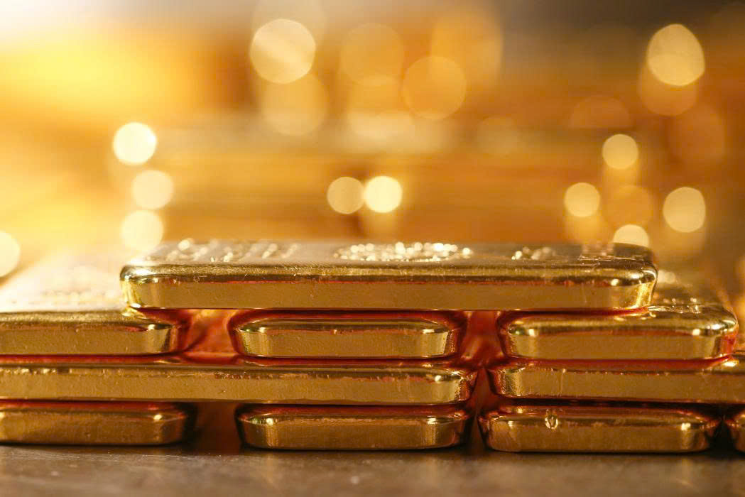 Giá vàng thế giới giảm do đồng USD mạnh lên và kỳ vọng Fed tăng lãi suất